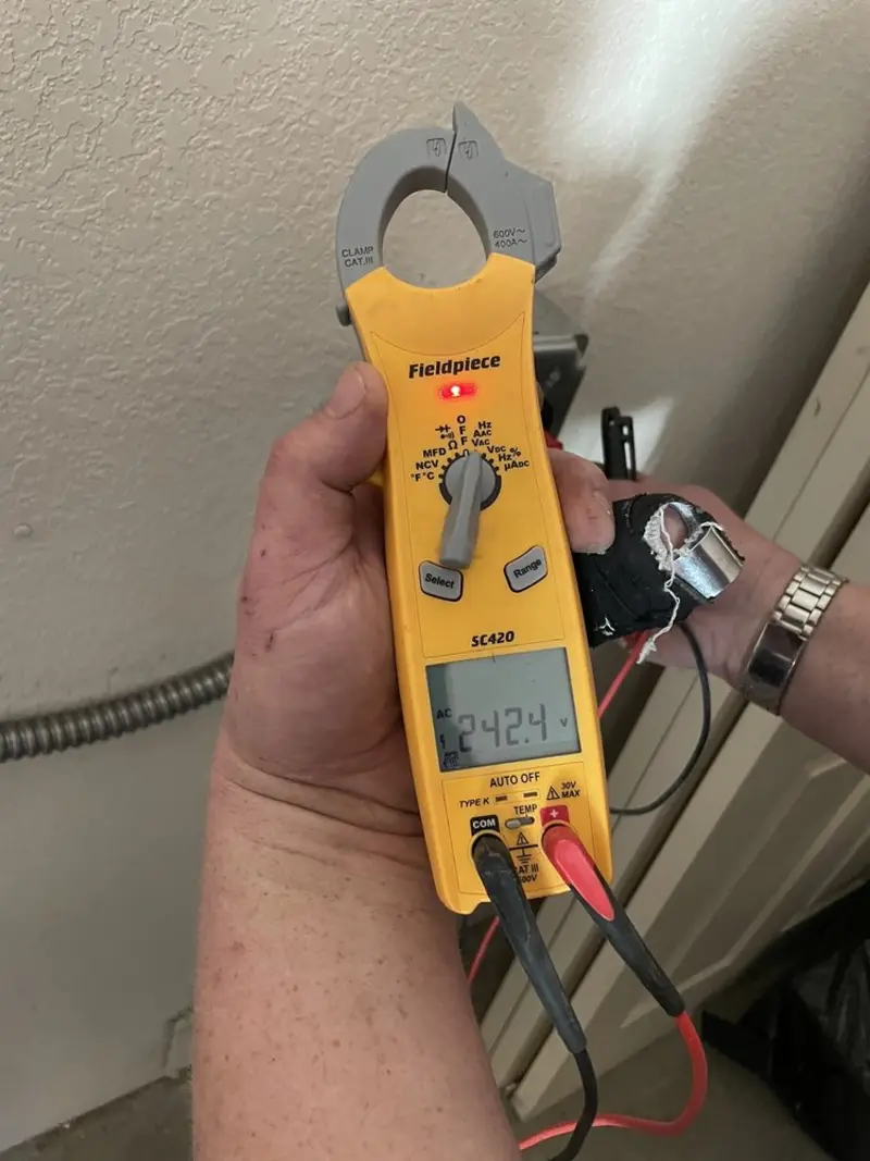 Voltage testing with clamp meter during Electrical Installation Services in Brunswick